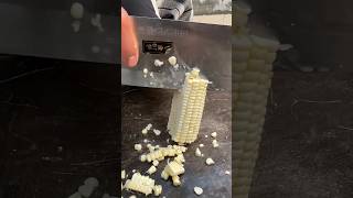 The simple process of cutting the maize corn,