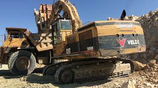 Caterpillar 5090B Shovel Excavator Loading Caterpillar Dumpers - Kivos Ate