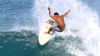 Local ripper surfer at Ehukai Beach park waves  at Hawaii North Shore.