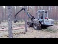 thinning of pine stand with vimek harvester nearby engure