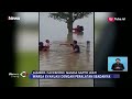 video amatir penyelamatan ibu dan anak terjebak banjir di pinggir tol ngawi inews siang 08 03