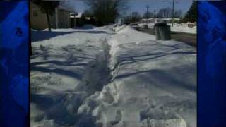 Some Struggle To Travel On Slippery Sidewalks