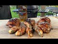 Chicken Thighs and Jalapeno Poppers Seasoned and Glazed on the Kamado Grill