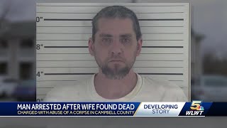 Docs: Husband charged, allegedly lived with wife's decaying body for days