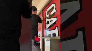 Installing perforated window vinyl with one way vision graphics