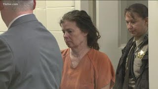 Wife accused of killing attorney husband makes first court appearance