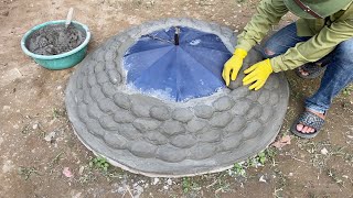 Unique creation from cement and umbrella - Beautiful duck-shaped fountain design in the garden