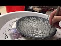 34. carving a porcelain plate