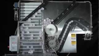 Pack West Machinery - Cap Orienting System for Oval Caps