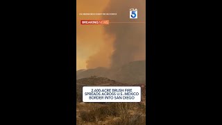 2,600-acre brush fire spreads across U.S.-Mexico border into San Diego