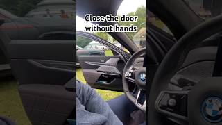 Close BMW's door with your feet