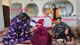 Pourya gets sick, his first wife feeds him.  His second wife gets jealous.