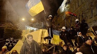 Ukraine's government maintains bitter standoff with protesters over European U-turn