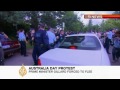 australia s pm dragged from protest