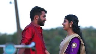 KeralaWedding Save the date Sreelesh Aswathi  Raybon colours wedding company