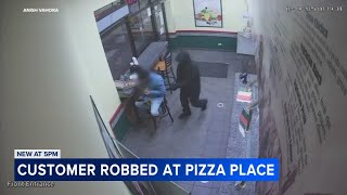 VIDEO: Customer robbed at gunpoint at pizza restaurant on Chicago's North Side