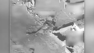 Coalition airstrike destroys an ISIS tank near Mosul, Iraq.