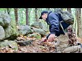 You have to see how much old stuff he just found behind this old rock wall