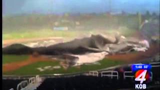 Weather causes tarp to fly at Isotopes game