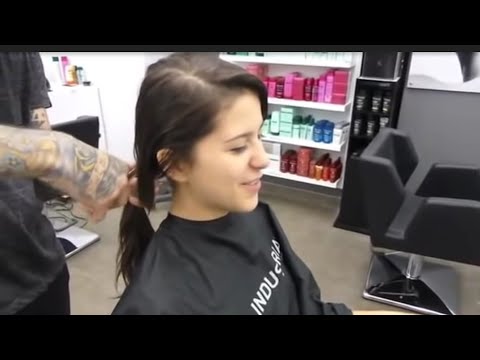 Watch as she goes from long hair to a pixiecut Watch as she goes from long hair to a pixiecut