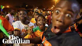Nigeria and Ivory Coast fans celebrate in streets after reaching AFCON final