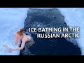 Experiencing snowstorm & traditional epiphany bathing in the Extreme North of Russia