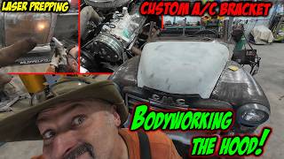 Body working the hood, custom A/C bracket and Laser stripping body panels