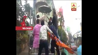 BJP with milk and ganga jal purified Shyamaprashad's statue at Howrah's Mandirtala