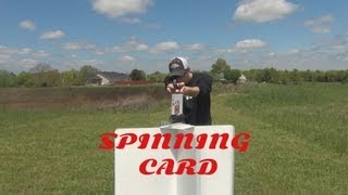 SPLITTING A SPINNING PLAYING CARD WITH A 22 BULLET