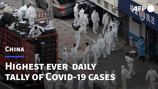 China records highest daily tally of Covid-19 cases | AFP