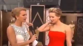 Jennifer Lawrence at the Oscars 2014 Red Carpet + Fall at The 86th Oscars®