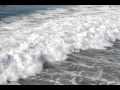 Surfers in Huntington Beach, California