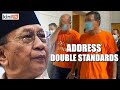 MACC told to address double standards in use of orange detention T shirts