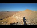 negev desert. extreme descent down a dangerous crater in search of wild animals