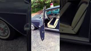 1957 caddy hearse side doors