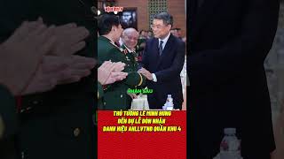 Lieutenant General Le Minh Hung attends the ceremony to receive the Hero of the People's Armed Fo...