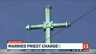 Married priest charged