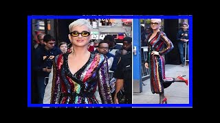 Katy perry stuns in a glitzy rainbow dress and ruby red heels as she arrives at good morning americ