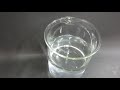 Sodium metal reacting with water in a beaker 1    MVI 1322