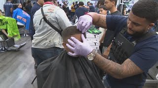 Students stepped out in style with third annual 'Haircuts with a Cop'