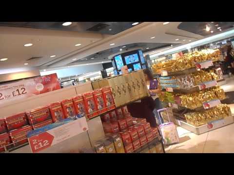 Walking inside Heathrow's airport terminal exploring their shops Walking inside Heathrow's airport terminal exploring their shops