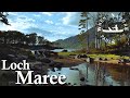 Solo, wilderness canoe camp on a Loch island in the Scottish Highlands [Loch Maree]