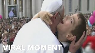 Boy's embrace with Pope Francis still resonates a decade later