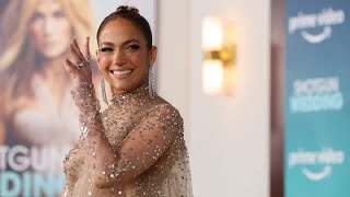 Jennifer Lopez looks stunning in sparkling gold dress at 'Shotgun Wedding' premiere