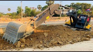 VOLVO EC210DL Excavator Digging Roads​