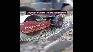 Compaction of handpacked hardcore as a road base layer