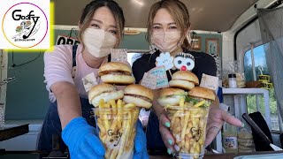 Street Food-Hamburger food truck made by beautiful women.