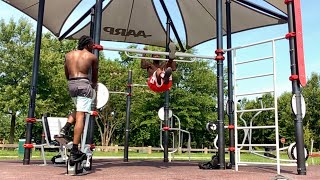 Scissor kicks on the pull-up bar with my son Timontae