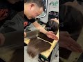 long hair cut off on chopping board