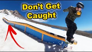 Snowboard Through a Kinked Rail